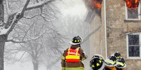 firefighters putting out house fire